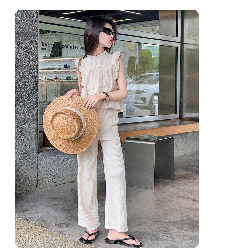 Completo bimba top senza maniche e pantaloni gamba larga_voghion.com
