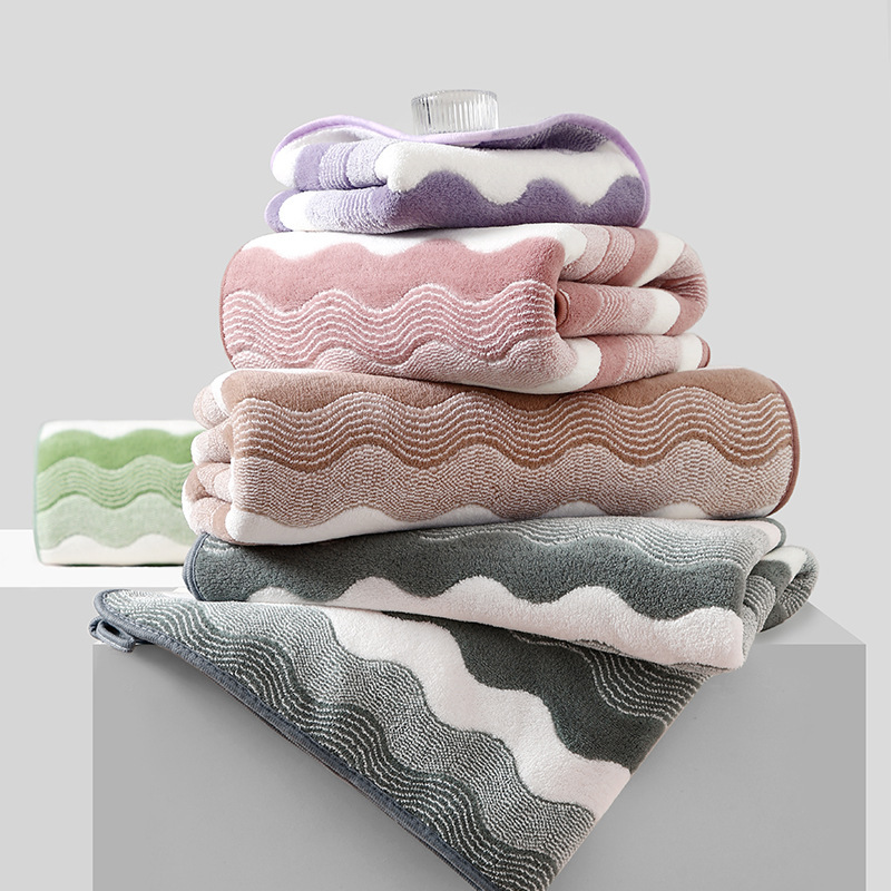 Plain adult coral fleece bath towel 70*140 simple water wave striped household absorbent coral fleece edging beach towel