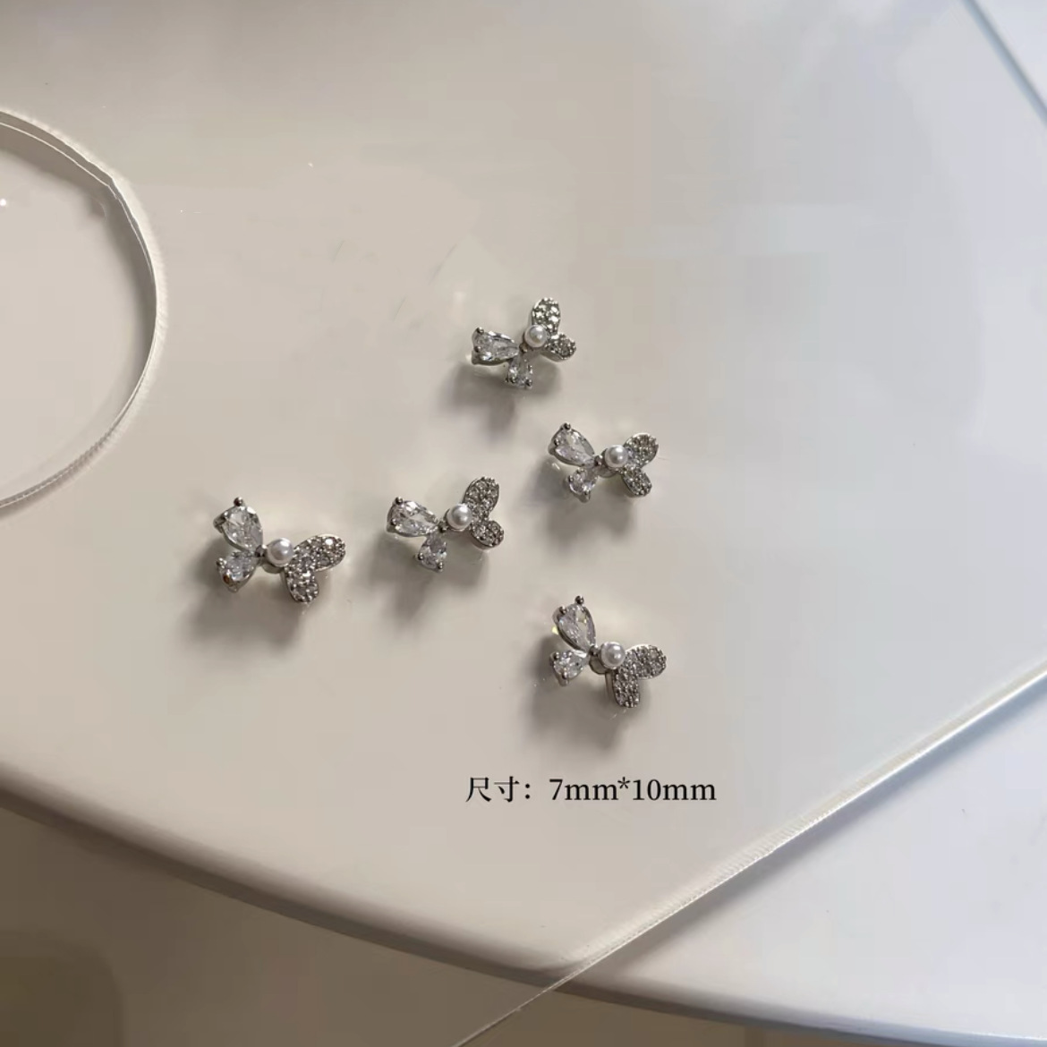 Celebridad de Internet nuevos accesorios de uñas Iris arco de alta retención de color ajuste arco de uñas diamante desgaste material de uñas diamante