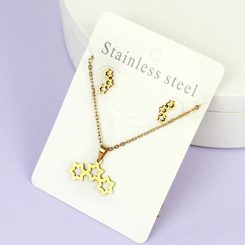 Net Red Butterfly Love Cross Personalidad Simple Juego de joyas de acero inoxidable Pendientes de oro Juego de collar al por mayor