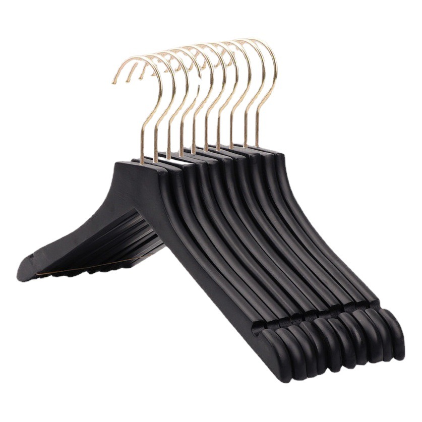 Perchas de madera maciza negra para tiendas de ropa, perchas de madera antideslizantes para tiendas de ropa infantil y femenina, perchas para pantalones, al por mayor.