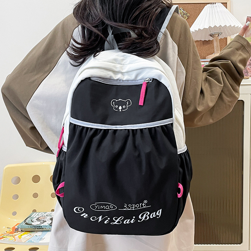 2024 nueva mochila de nailon para mujer, ocio, viaje al aire libre japonés, mochila escolar de gran capacidad para estudiantes de secundaria, mochila al por mayor