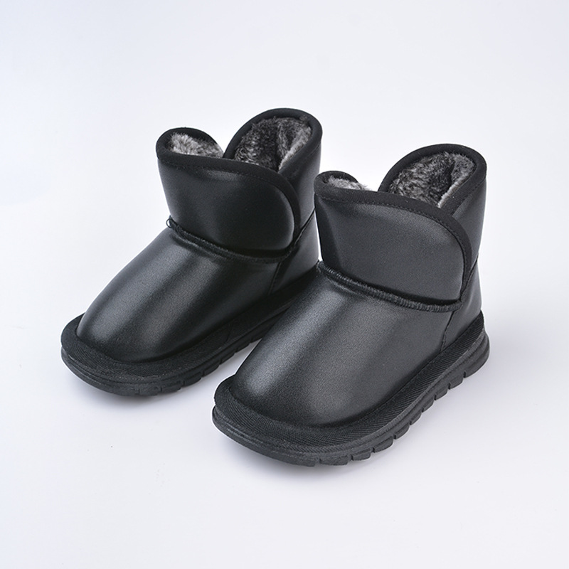 Botas de nieve cálidas para niños, muy vendidas en invierno, botas casuales de algodón con forro polar para niños y niñas, venta al por mayor transfronteriza de calzado de algodón.