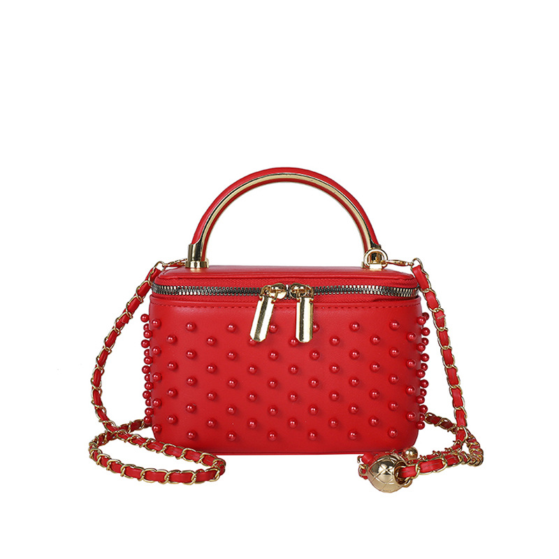 Caja de mano de alta sensación, bolso cuadrado pequeño para mujeres 2026 nueva moda transfronteriza nicho de moda ligero de lujo cadena mochila