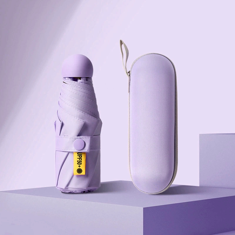 50% de descuento paraguas de cápsula de seis huesos paraguas de Sol de doble uso pequeño paraguas de bolsillo portátil simple pegamento negro paraguas de protección solar al por mayor