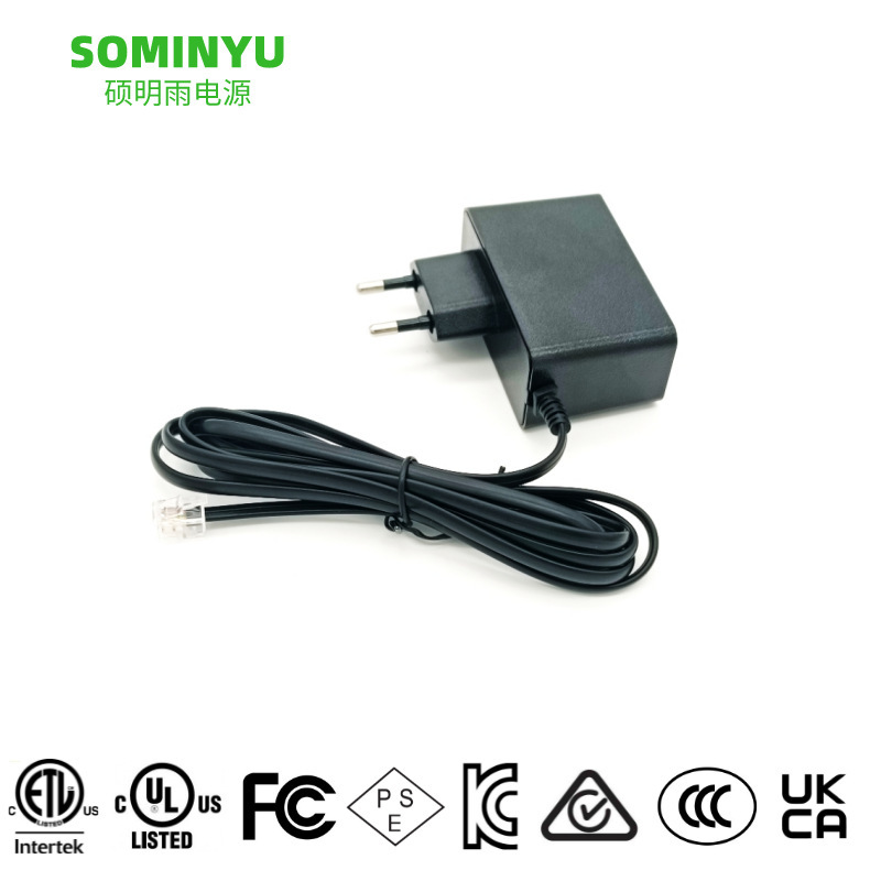 Production of Ce Certified Ukca Certified 12V Network Cable Head Crystal Head Power Adapter