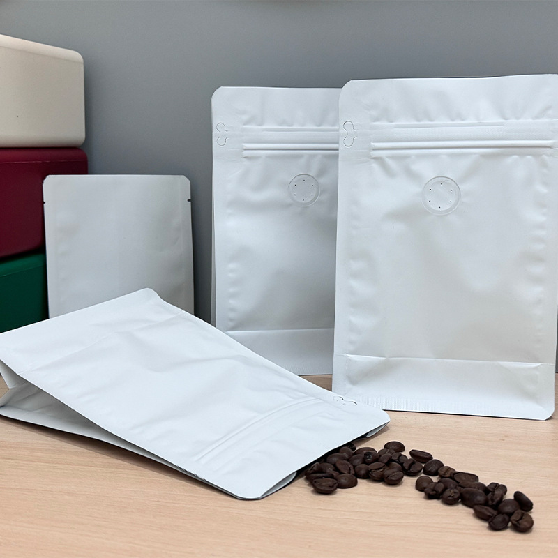 Bolsa de embalaje de granos de café sellada de ocho lados Bolsa de embalaje sellada de papel de aluminio al por mayor Válvula de escape Bolsa con cremallera lateral Bolsa de café personalizada