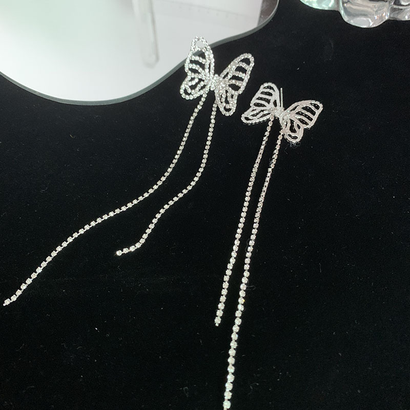 Nihaojewelry Mode Papillon Creux Long Gland Boucles D&#39;oreilles En Cuivre Bijoux En Gros display picture 3