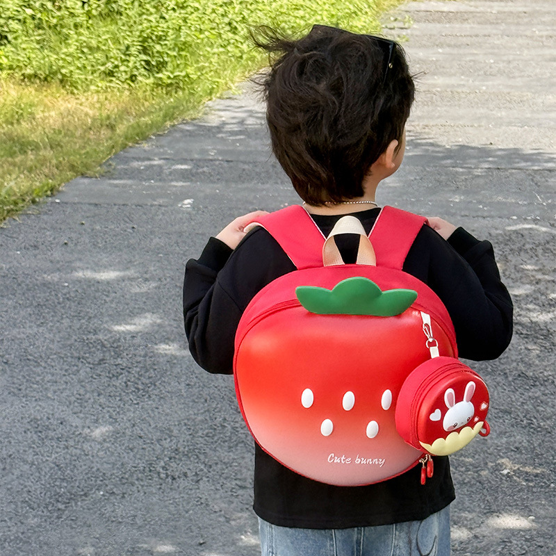 Mochila de dibujos animados para niños y niñas encantadora mochila escolar de estilo de fresa 2025 nueva mochila infantil de cáscara de huevo