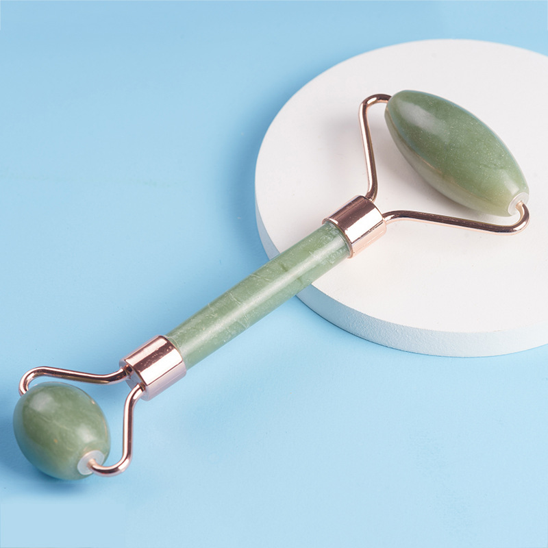Redondo y cómodo fácil de sostener el rodillo de masaje Xiuyu de doble cabeza suave rodillo de jade facial rodillo de jade contenedor de belleza