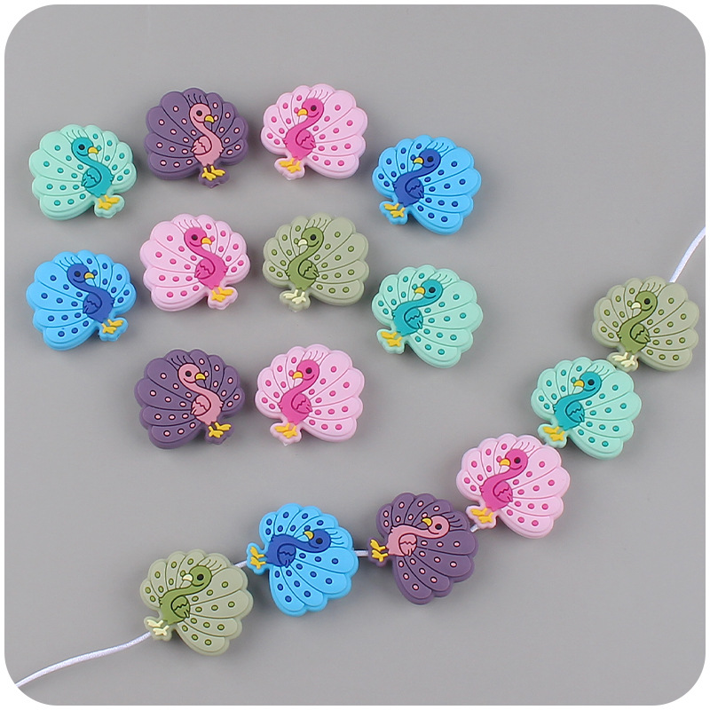 Bebé suministros de dibujos animados animal Pavo Real silicona mordedor creativo DIY bebé molar pezón anti-gota cadena Accesorios