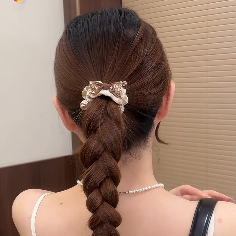Cuerdas de cabello de viento pastoral pequeñas y altos valores faciales, anillo de cabello de intestino grande, sensación de una niña de banda de goma flácida, cuerdas de malla de banda de bola de cabeza