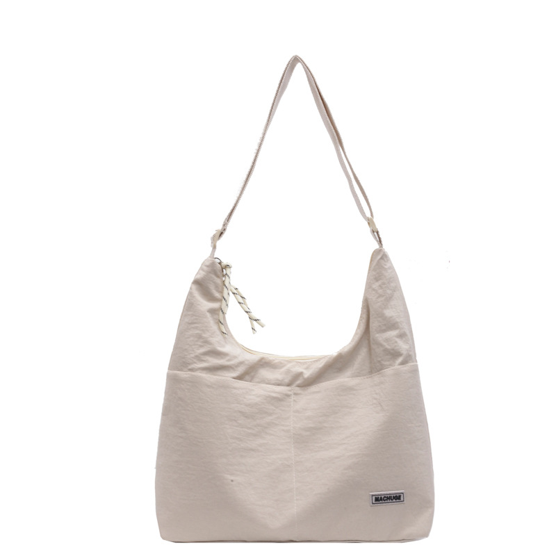 Bolso Tote de todo fósforo de moda para mujer 2024 nuevo bolso de hombro coreano popular de este año bolso de clase de gran capacidad para estudiantes universitarios