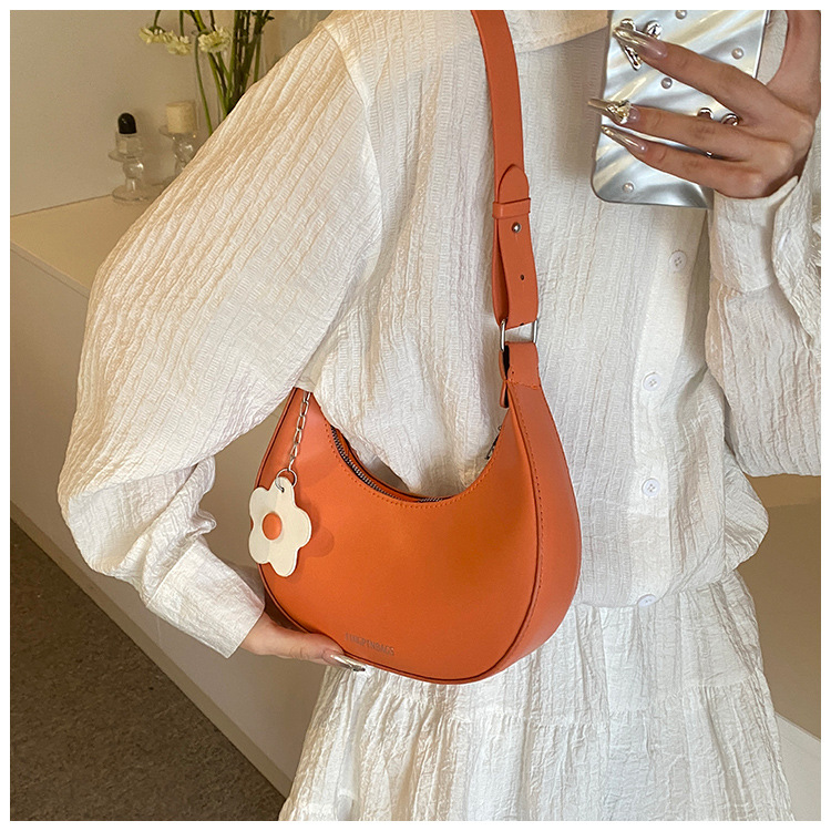 Cross-border women's bag 2024 New style, trendy texture, versatile, ins fashion single-shoulder armpit bag, small flower pendant, crescent moon bag undefined