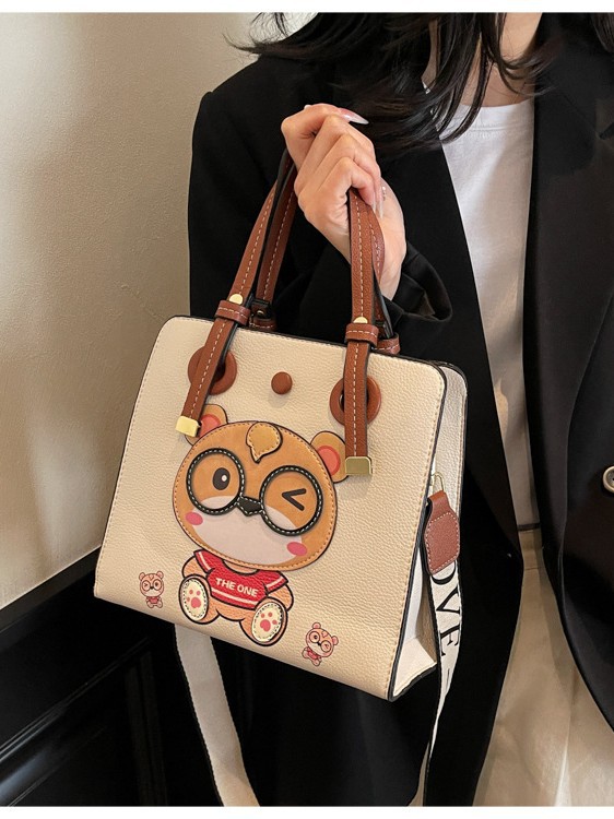 Bolso Tote transfronterizo para mujer de gran capacidad 2025 nuevo bolso bandolera de banda ancha salvaje de verano bolso de clase portátil de ocio