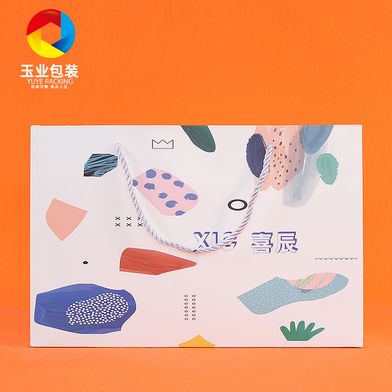 服装手提袋女装手提袋白卡纸纸袋服装购物袋鞋帽服装购物纸袋印刷