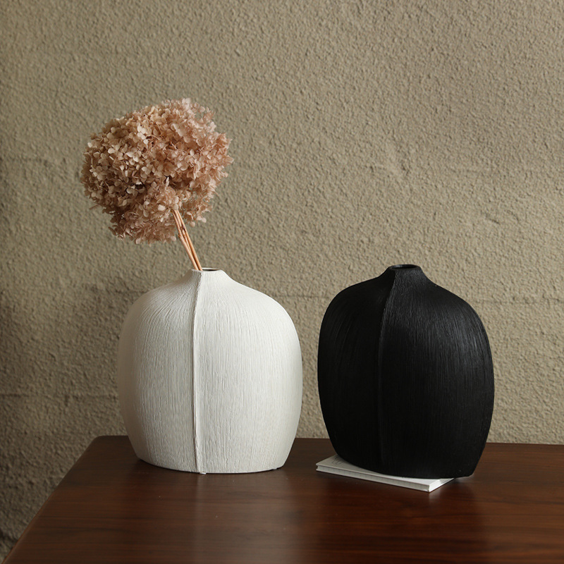 El viento silencioso de la cerámica negra estampada ornamentos de vasijas de flores de la sala de estar armario de televisión entrada flor seca decoración creativa