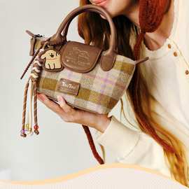 TOU线条小狗格纹毛呢饺子包2025秋冬新款迷你手提斜挎小包包女