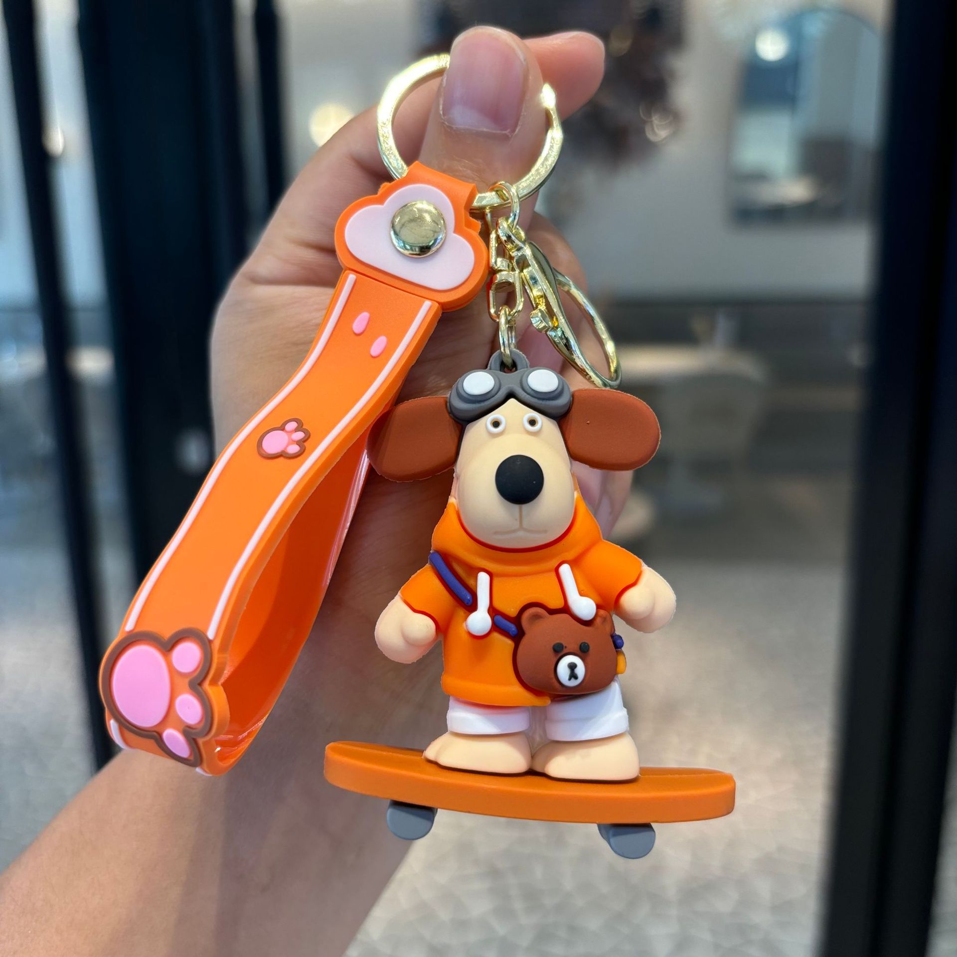 Jefe de perro llavero muñeca colgante llave de PVC pequeño regalo dibujos animados adornos lindos llavero de la máquina