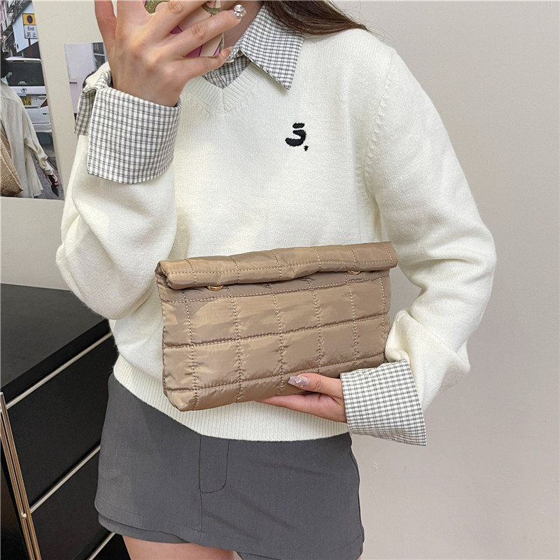 Simples paquetes de cena coreanos de color sólido de estilo extranjero para mujeres de alto nivel temperamento personalidad de fiesta bolsa de mano