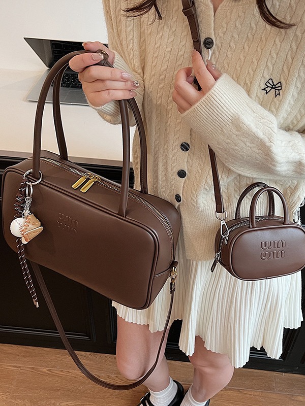 2026 nuevo nicho de moda bolos bolsos de gran capacidad bolsos de transporte de alta calidad sensación de hombro de un solo brazo