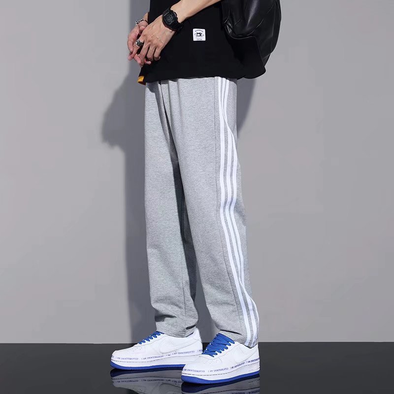 Pantalones de rayas japonesas primavera y otoño de los hombres de moda ins Pantalones deportivos rectos sueltos estilo coreano de moda Pantalones casuales a juego