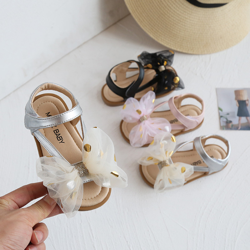 Versione coreana di fiori dolci da bambina con grande fiocco, scarpe per bambini, sandali per le vacanze al mare, estate 2021_voghion.com