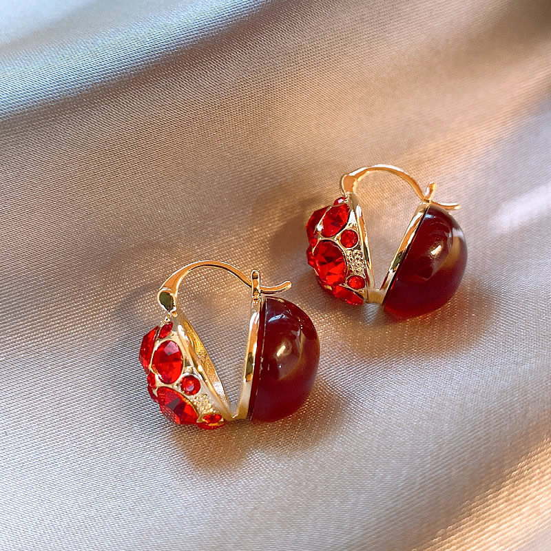 Diamante rojo-incrustado hoja de arce pendientes geométricos Luz de invierno de lujo de alto grado pendientes de Año Nuevo nicho pendientes de todo fósforo al por mayor