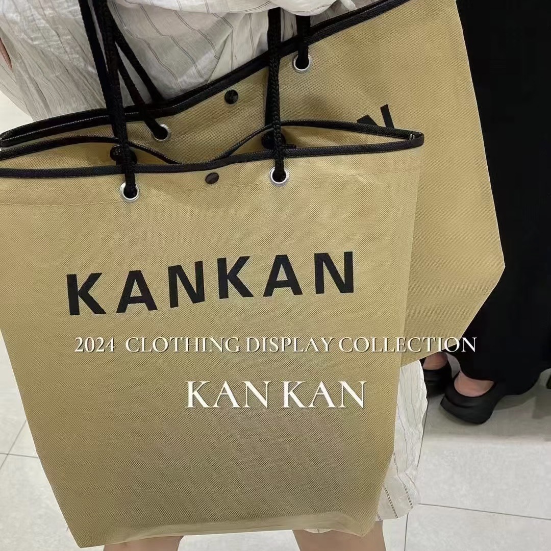 Handheld bag non-woven cloth