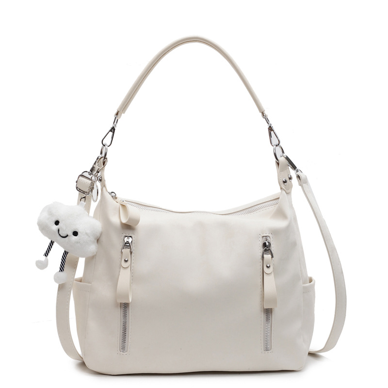 Bolsa suave Pitot para mujeres de gran capacidad 2025 nueva alta sensación de bolso de mano de viaje simple mochila de bolsillo casual