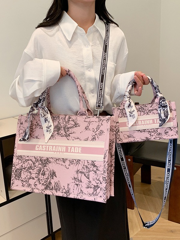 Bolsa de mano de comercio exterior transfronterizo para mujeres 2024 nueva moda simple impresión de letras mochila de hombro casual
