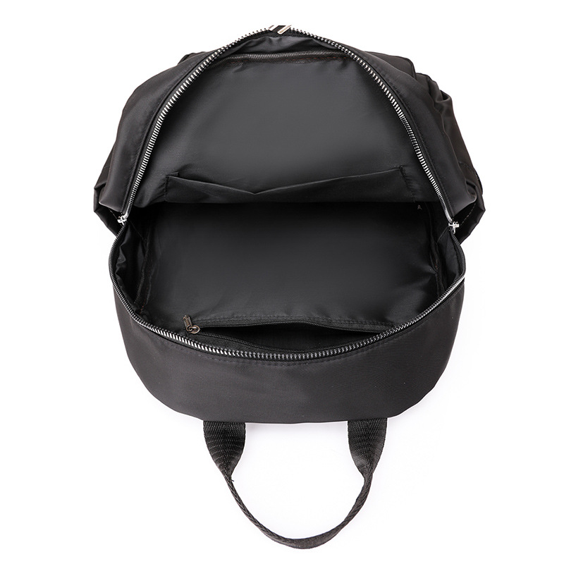 2024 verano nuevo estilo casual damas mochila de nailon simple y versátil mochila de computadora de gran capacidad para estudiantes al por mayor