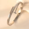 Nail bracelet with diamond steel color