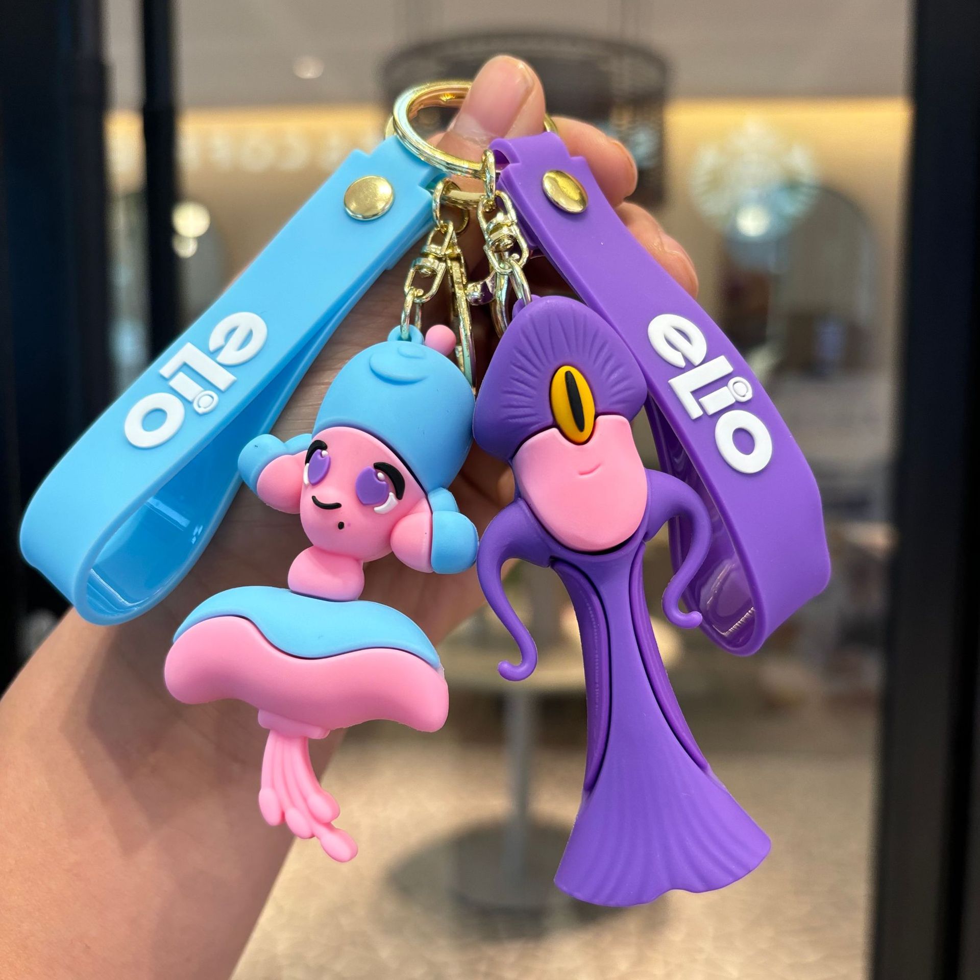 Cartoon transfronterizo Earth Envoy Keychain Colgante Keychain Car accesorios bolsos lindos para hombres y mujeres pequeños regalos