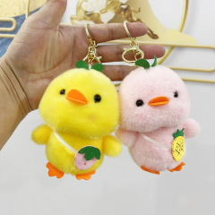 かわいい果物のアヒルの鍵は公の子の包みを掛けて機のぬいぐるみのぬいぐるみの贈り物の人形を捕まえて卸売りします。