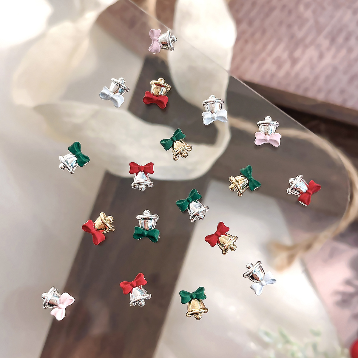 Net red Christmas bell nail jewelry bow gold and silver alloy exquisite light luxury wind wear armor decoration wholesale