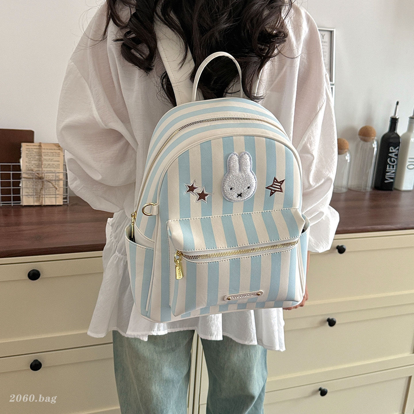 Verano fiesta mochila conejo popular lindas rayas de dibujos animados nuevos estudiantes 2026 mini mochila de mujer