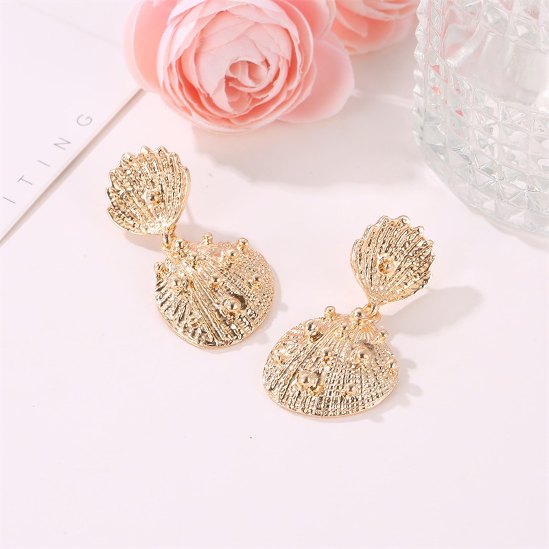 Fashion Creative Geometric Metal Star Shell Irregular Earrings Wholesale display picture 6