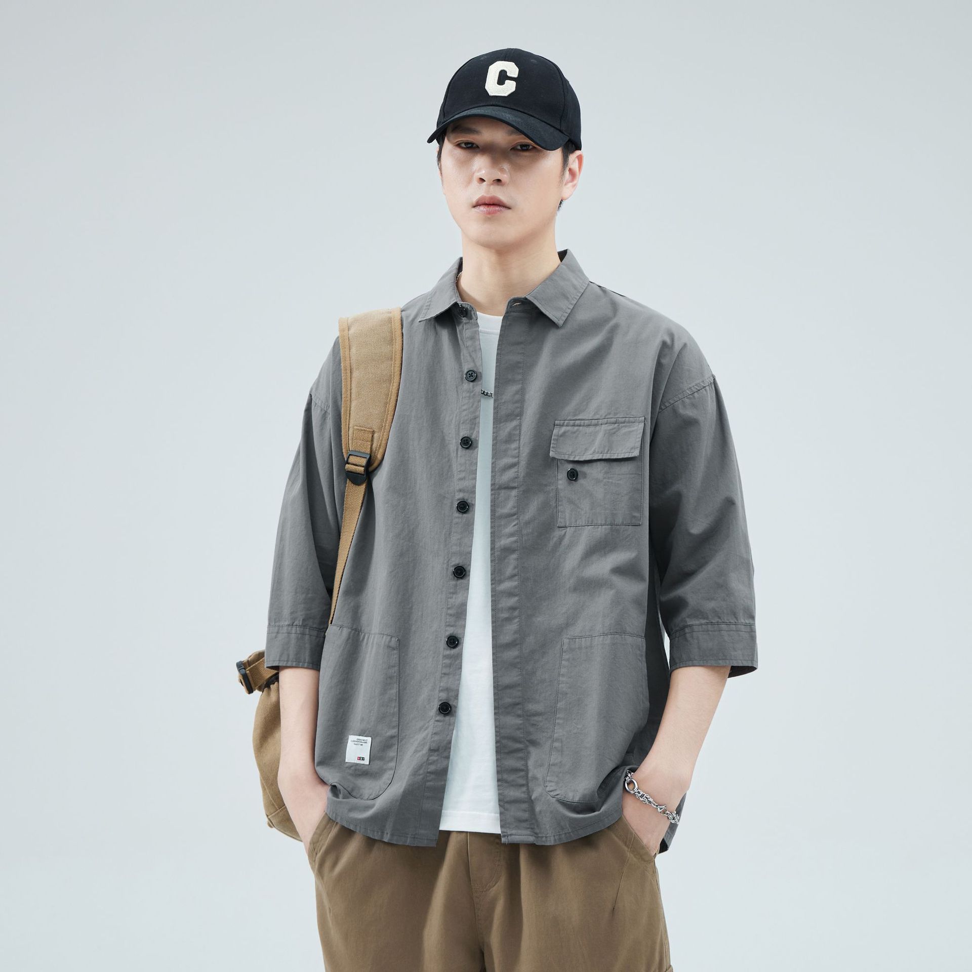 Camisa de trabajo holgada para hombre, primavera y verano, totalmente de algodón, estilo coreano, estilo americano informal, mangas tres cuartos, cuello único, bolsillo, transpirable y que absorbe la humedad.