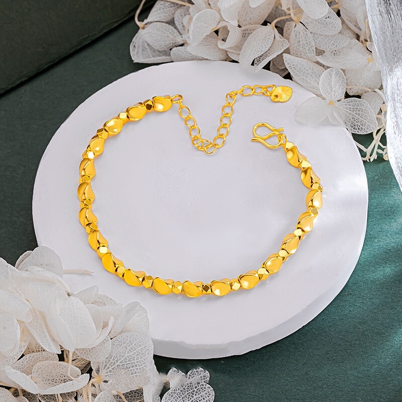 Gold-Plated Dazzling Twist Bead Bracelet with a Unique Trendy Sparkling Silver Bead Design for a Niche and Stylish Accessory