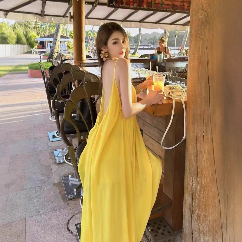 Seaside Vacation Sexy Backless Strap dress Women's Summer New Loose A- line Dress Gentle Yellow Long Dress