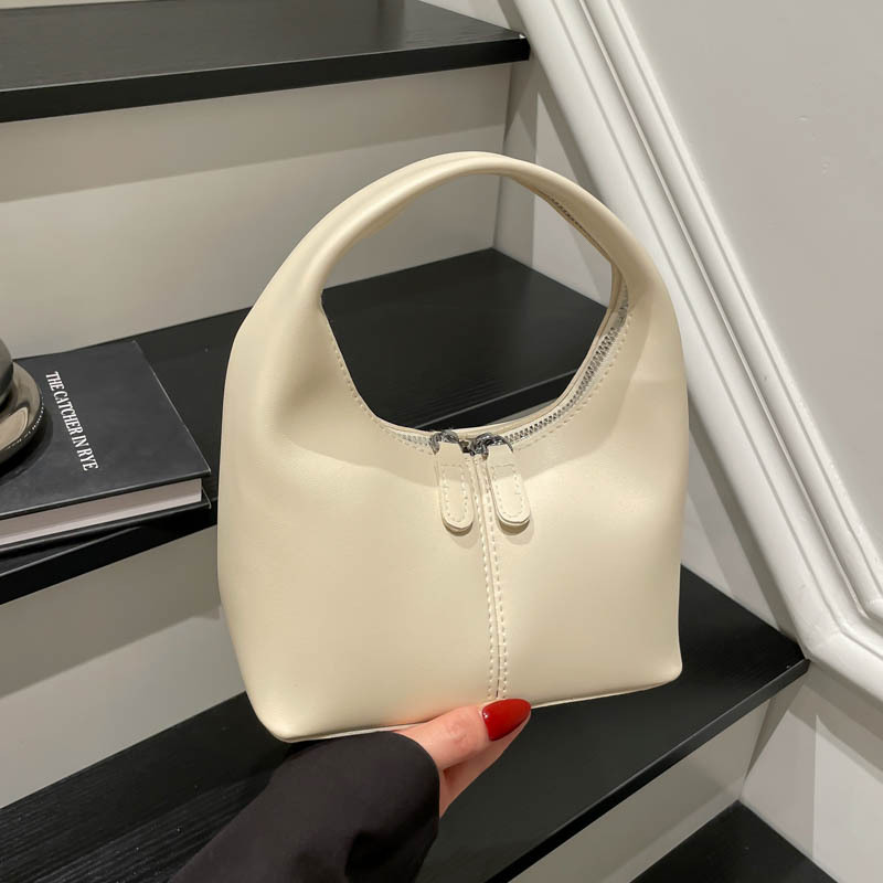 Bolso de diseño de nicho Tide2025 nuevo bolso de mano encantador para mujeres texturas retro versátiles bolso de mano
