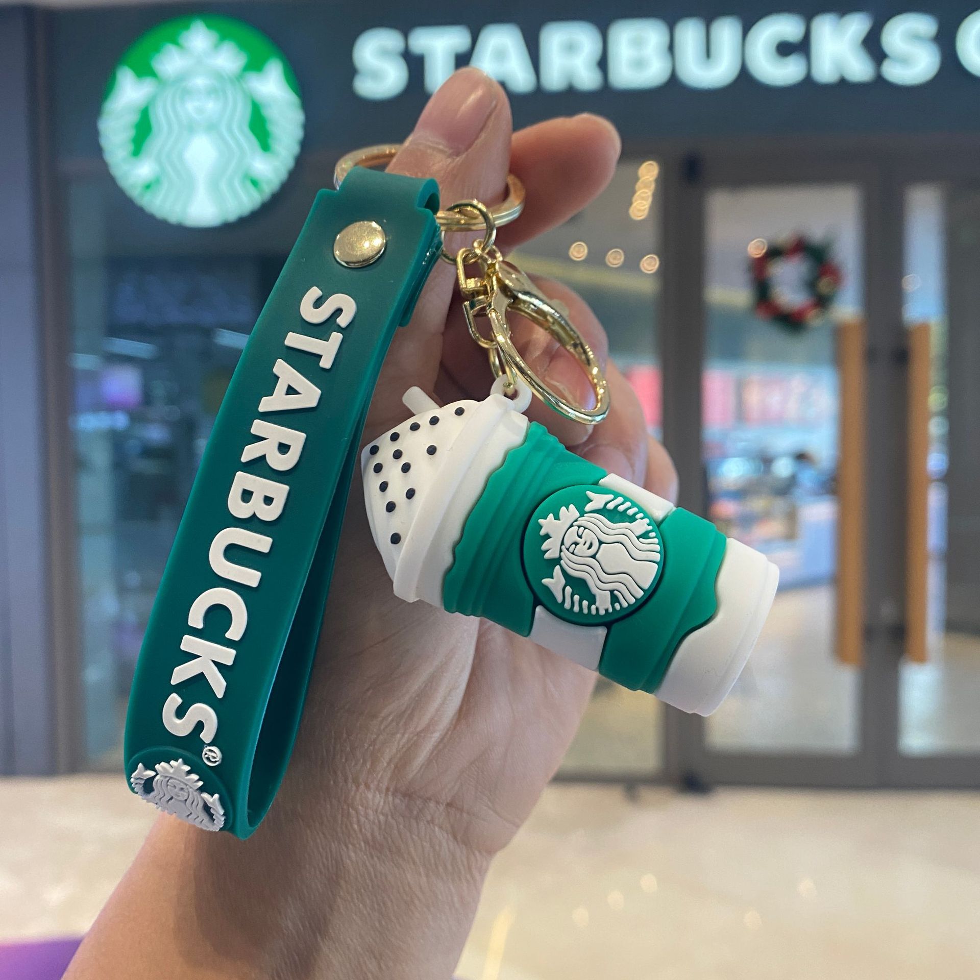 Cruz-frontera Starbucks leche taza llavero muñeca máquina pequeña bolsa de regalo accesorios regalo de Año Nuevo al por mayor