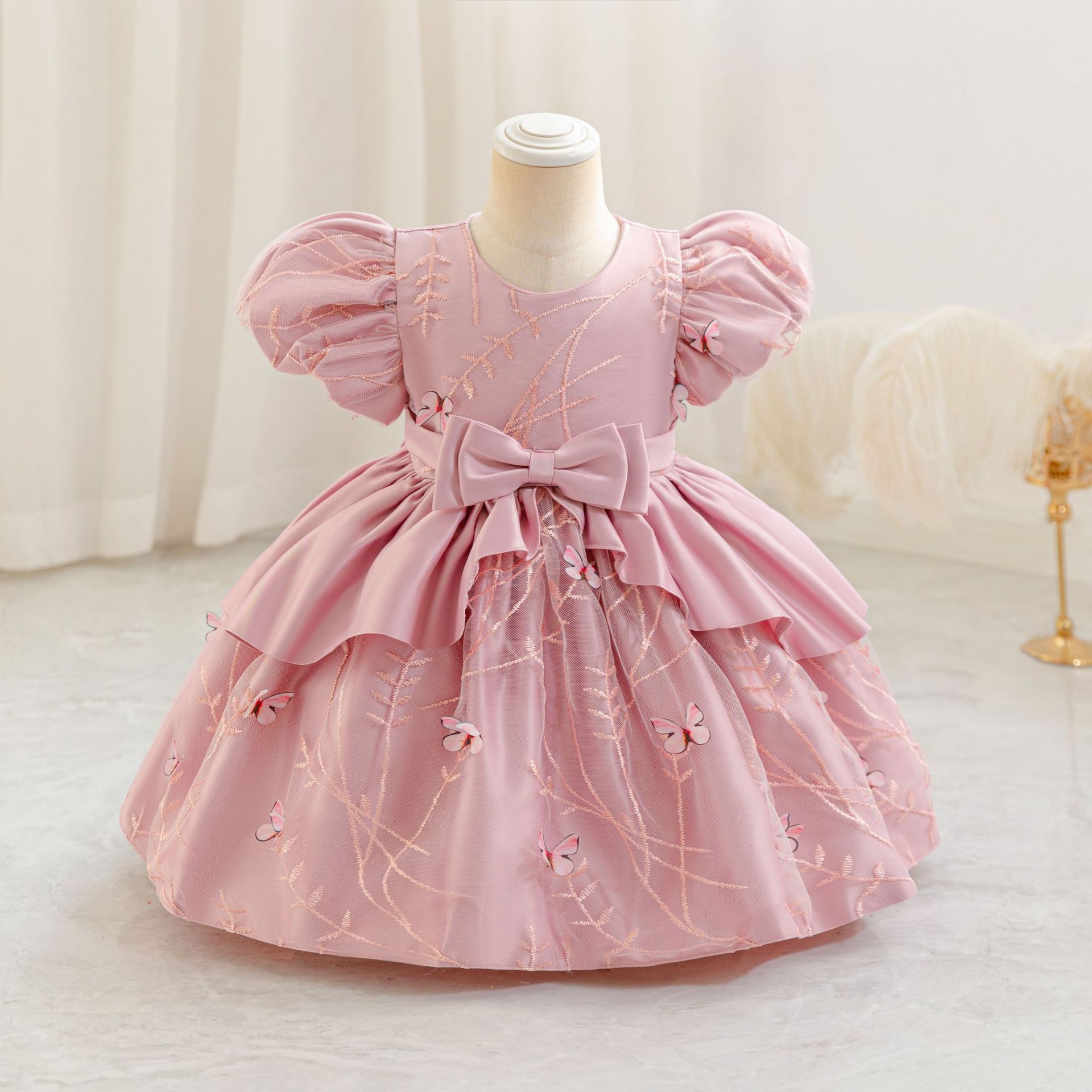 2025 nuevo bebé transfronterizo vestido infantil ropa de abrigo de arco vestido de bebé vestido vestido de abrigo al por mayor