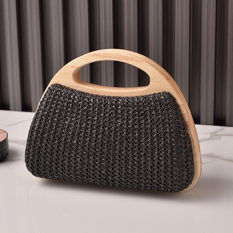 2025 nuevo bolso de mujer con clip de madera maciza tejido de paja bolso de verano de vacaciones junto al mar pequeño bolso de mujer fresco venta caliente transfronteriza