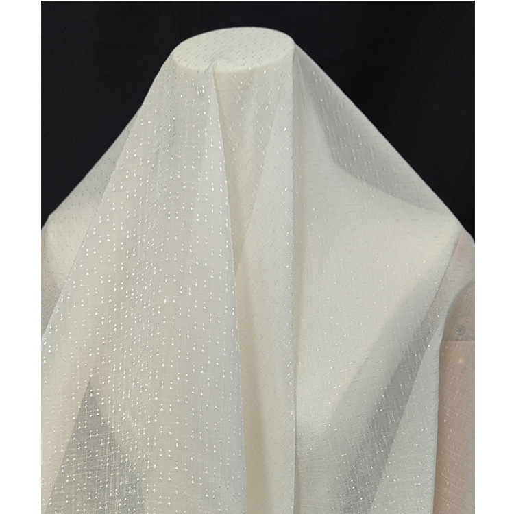 星星绉欧根纱 加密波点网纱布料 生成色浅绿色波点