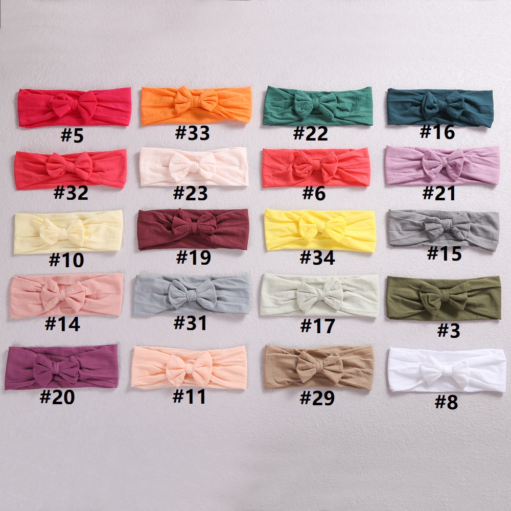 European and American cross-border new children's hair accessories baby bow headband baby care door nylon hair band wholesale_voghion.com