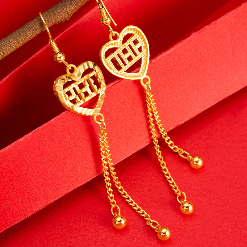 Vietnam arena oro amor oído líneas 520 hueco borla de las mujeres gotas para los oídos no se desvanecen temperamento imitación oro suministro directo de fábrica