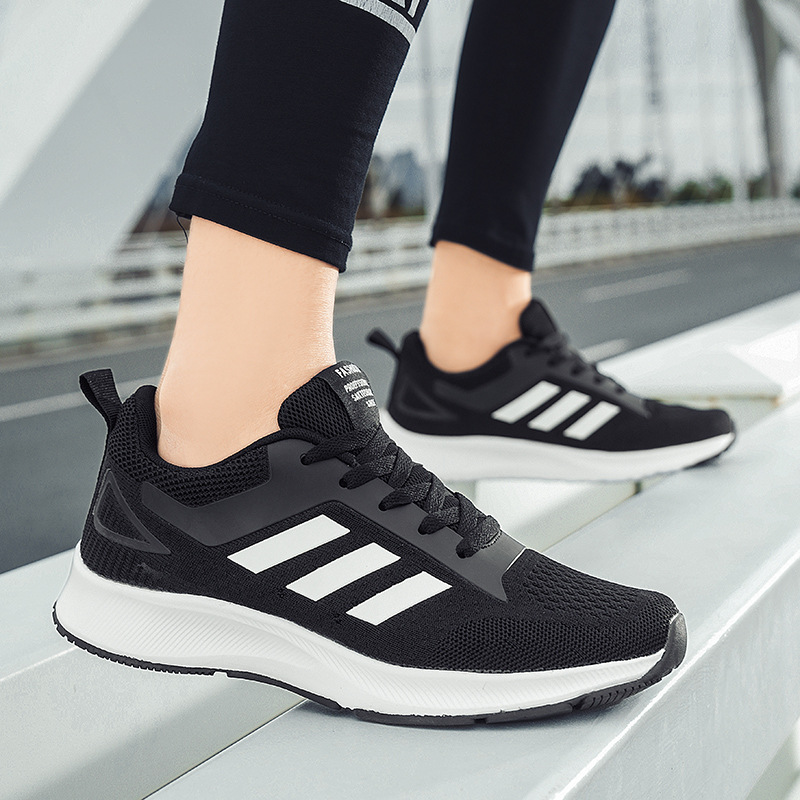 Lightweight universal summer breathable white sneakers with…