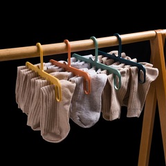 Simple-style single plastic hanger, nine-hole balcony anti-wind clothing drying rack, scarf and sock round hanger